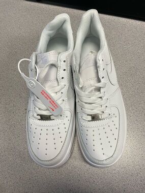Nike All-White Leather Low-Top Sneakers